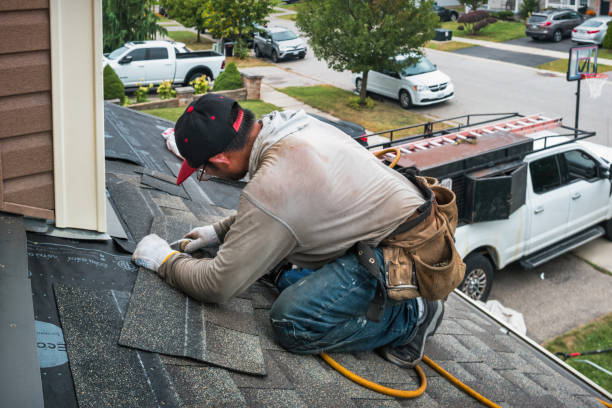 Professional Roofing technician working in White Hall, WV